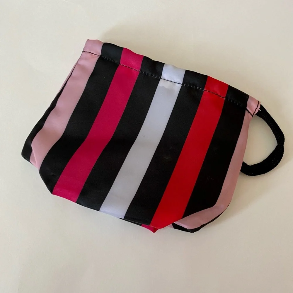 NWOT VICTORIA’S SECRET PINK AND RED STRIPED WATERPROOF COSMETIC BAG💗